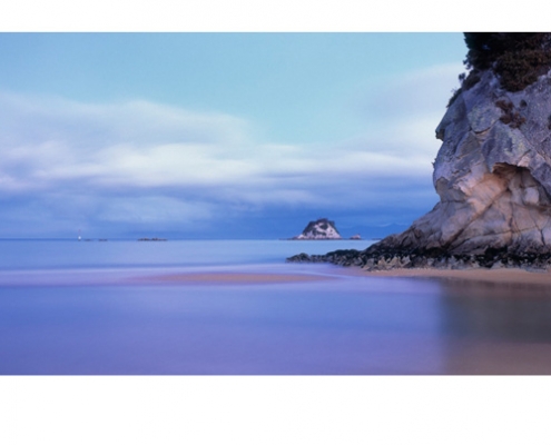 Dusk at Kaiteriteri near Abel Tasman National Park, New Zealand. Browse images of New Zealand for art for an office or prints for the home. Canvas photos.